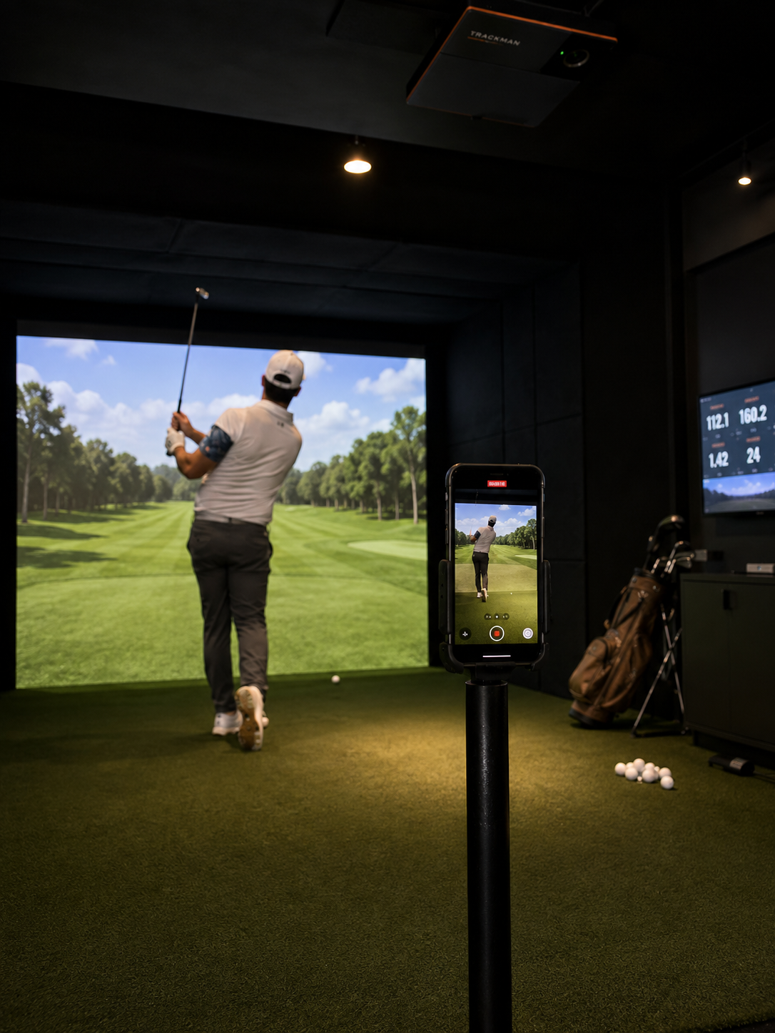 Golfers competing in weekly tournament at TrkHaus Golf Club indoor simulator Boise Idaho